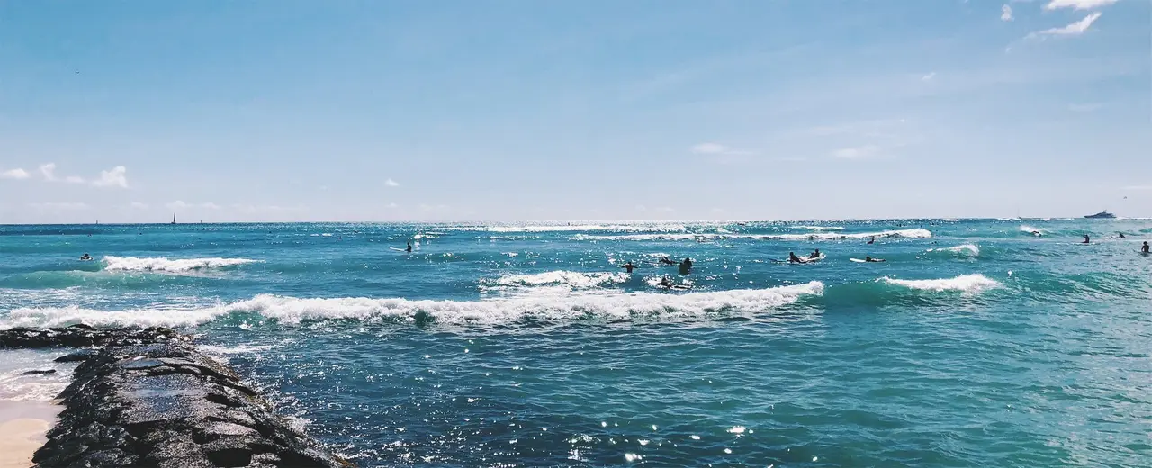 Blue sea with breaking waves off Waikiki Beach, Hawaii