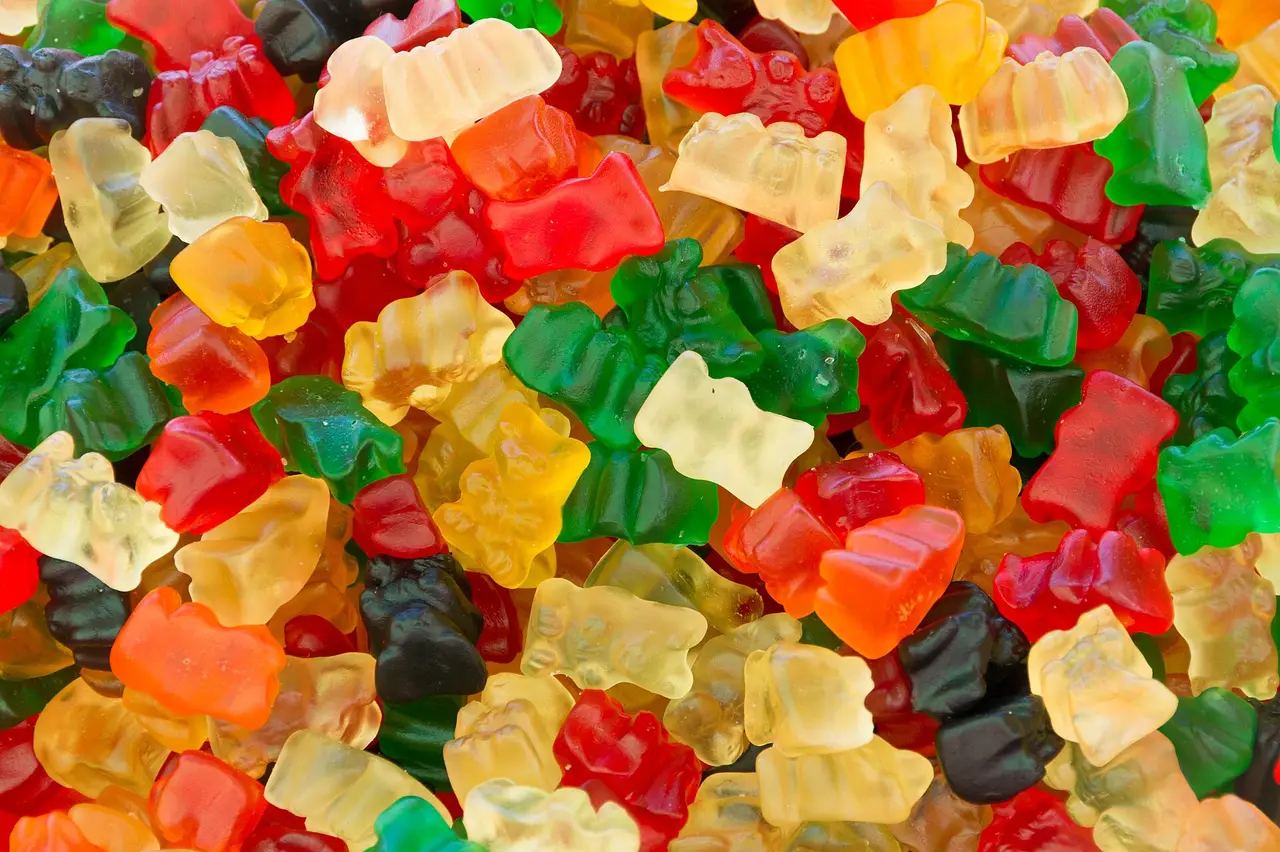 A heap of red, green, yellow and clear gummy bear sweets