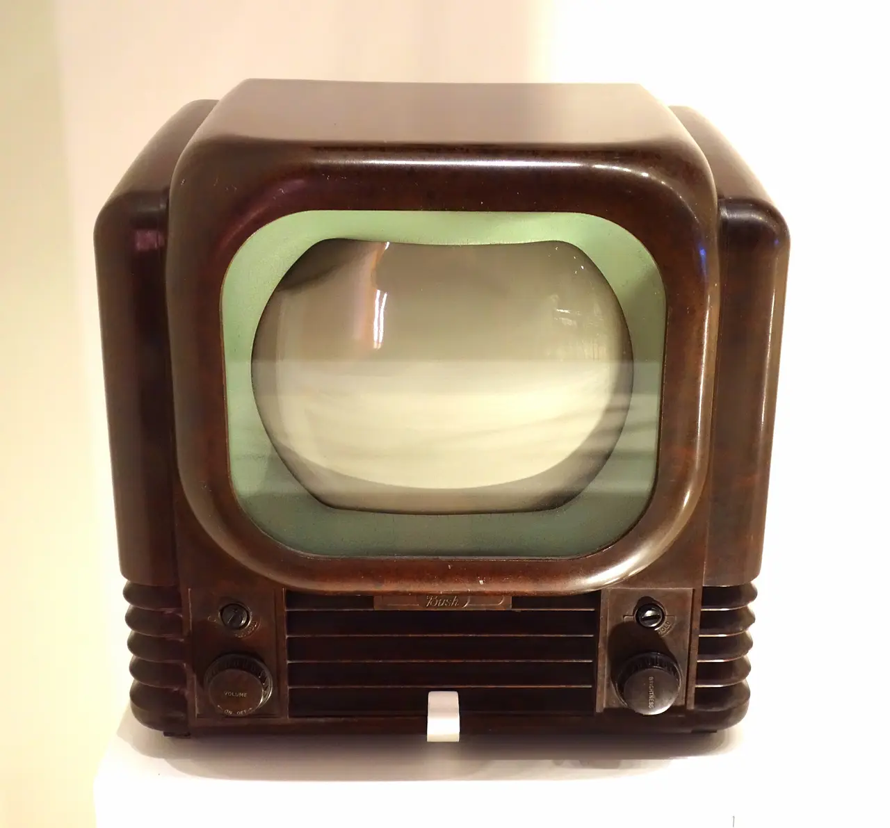 Brown 1950 portable television set with a curved screen
