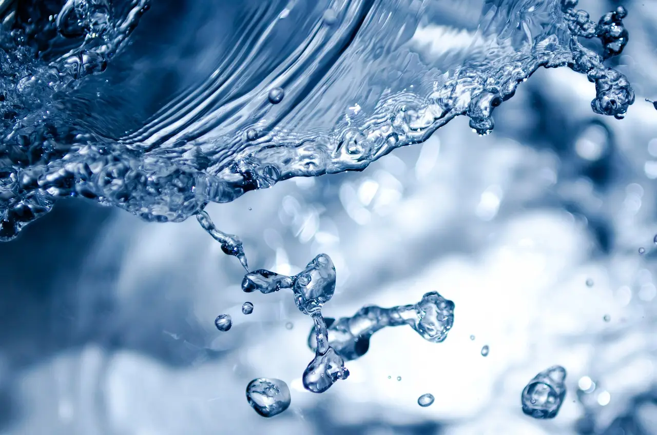 Water splashing with droplets thrown into the air
