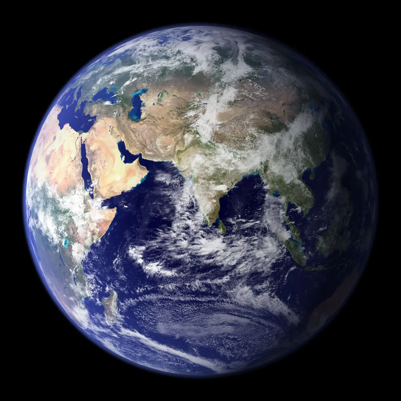 The Earth from space with Africa and Asia under white cloud