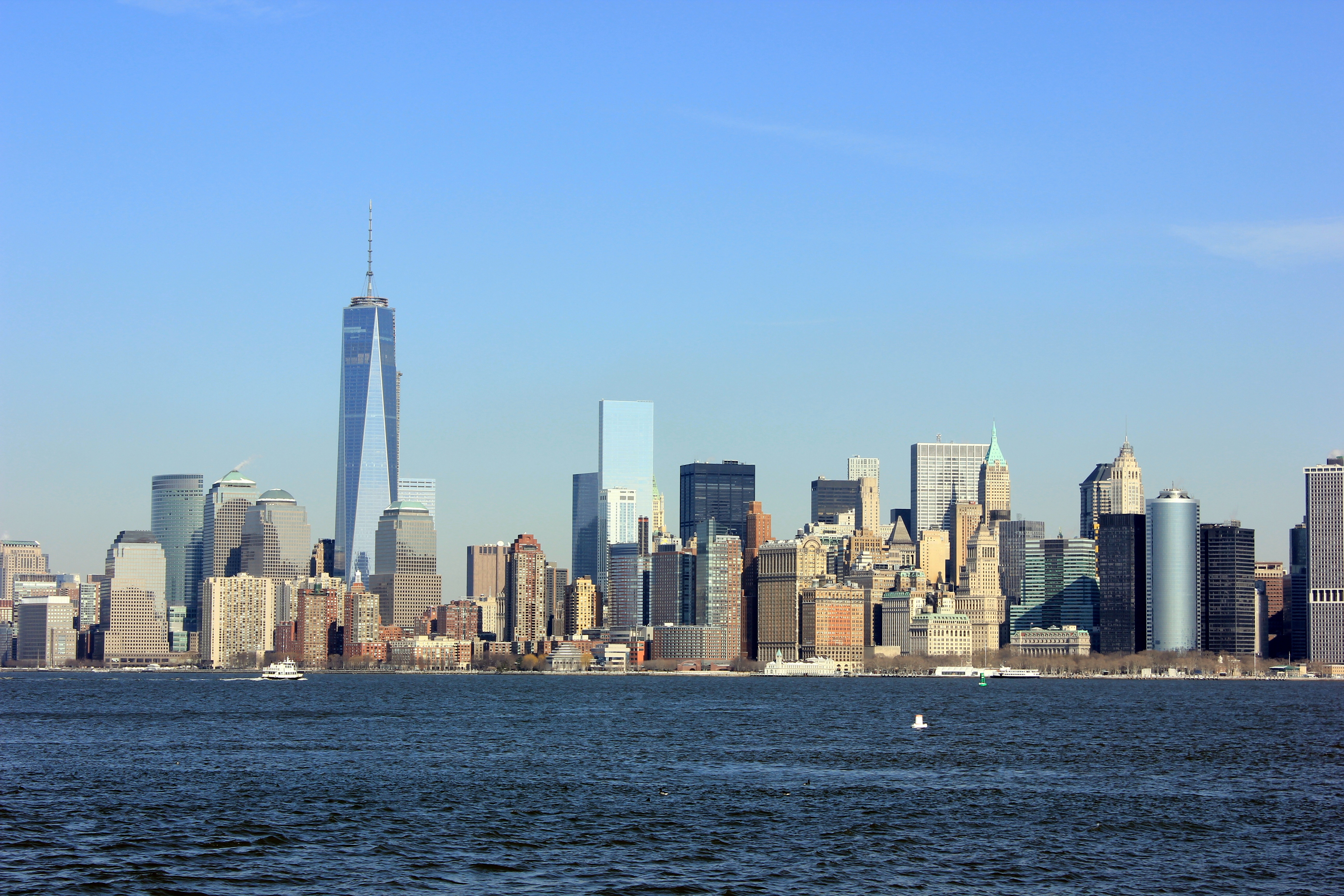 Manhattan skyline new york city blue water sky free image