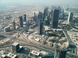 view of modern city at sea and Sheik Zayed Road, uae, dubai