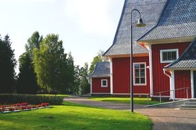 scandinavian style red wooden bar buildings in park