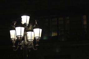 vintage street lanterns in night city