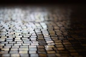 old brown cobblestone pavement close up