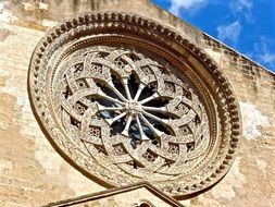 rock ornamental circular window desidn building