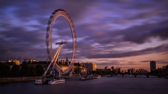 london eye, cityscape with ferris wheel at evening sky, uk, england