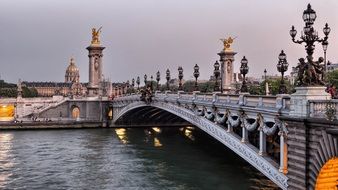 landscape of Pont Alexandre III, bridge across seine river at evening, france, paris