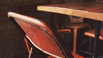 grunge metal chair at table