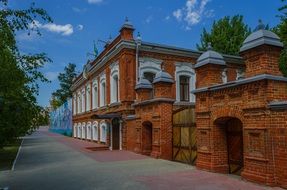 old red briks house with white windows, kazakhstan, kostanay