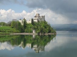 poland castle niedzica water reflection clouds day view