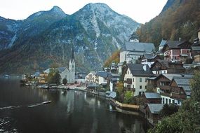 picturesque old village on lake shore at mountains, austria, hallstatt