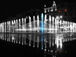 fountain at night city, poland, poznan