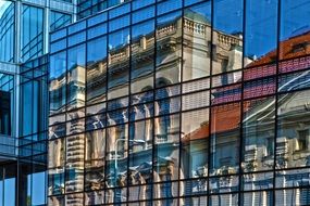 building reflection on glass facade, czech, prague