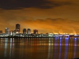 illuminated city at water, skyline at dusk, usa, california, long beach