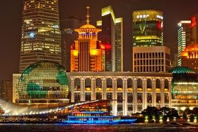 bright colorful night lights in skyline of modern city, china, shanghai