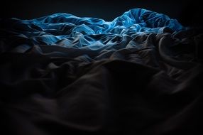 dark blue bed cover surface