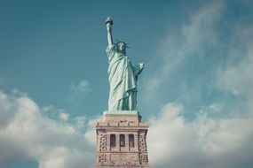 statue ofliberty above clouds, usa, nyc