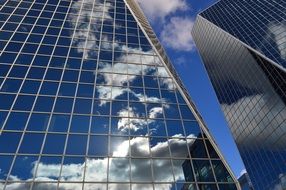 clouds reflection on glass face