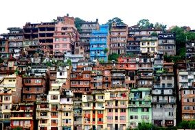 bright painted grunge apartments on hillside, nepal