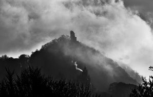 dragon rock castle ruins in fog, germany, bonn