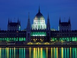 parliament building in colorful night lights at deep blue sky, hungary, budapest