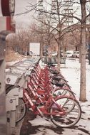 bicycles in row on parking at winter, usa, Colorado, denver