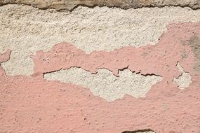 Old wall with pink plaster