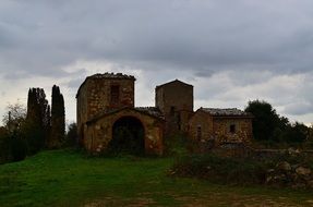 abandoned ruined building on hill at cloudy sky, italy, tuscany
