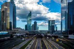 trains on railway station in urban cityscape