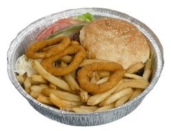 cheeseburger with french fries and onion rings in container