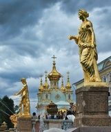 golden statues at palace, russia, peterhoff
