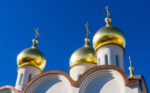 gold domes of orthodox church at sky, russia, moscow