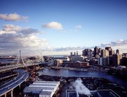 suspension bridge at urban skyline, usa, massachusetts, boston