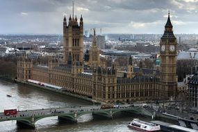 westminster palace in cityscape at cloudy day, uk, england, london