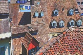 old red clay tile roofing in town