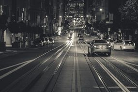 cars on road at night city