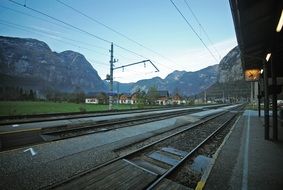 railway station at countryside in mountain landscape