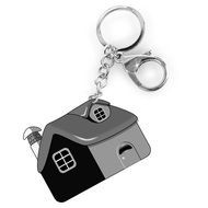 keychain in the shape of a house on white background