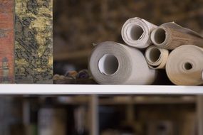 paper rolls on table