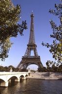 eiffel tower among trees, france, paris