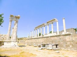 landscape of rock ruins of ancient roman columns in turkey