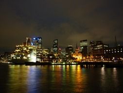 cruise ship in port at night cityscape, australia, sydney