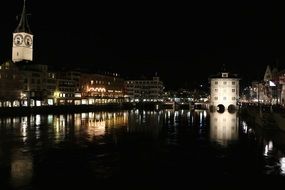 old city with water reflection at night, switzerland, zurich