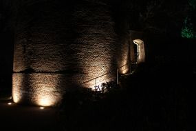 brick wall of tower at night, germany, wassenberg