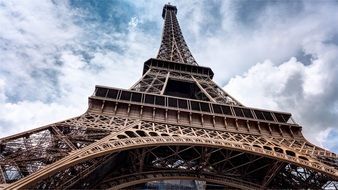 eiffel tower at cloudy sky, france, paris