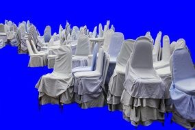 white chairs blue background