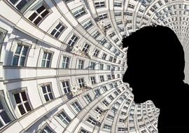 male face silhouette at circular facade, collage