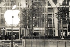 apple inc logo on glass door, china, shanghai